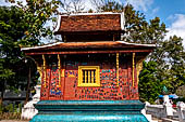 Wat Xieng Thong temple in Luang Prabang, Laos. the Ho Tai, the library where the Buddhist Tripitaka used to be kept. 